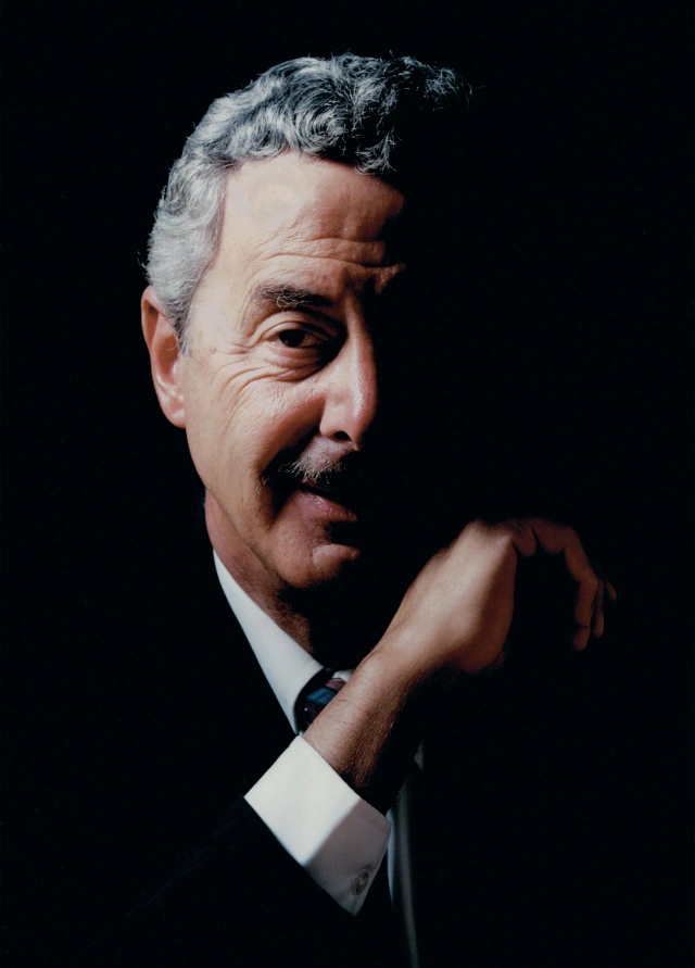 ABOUT GERARD L. CAFESJIAN